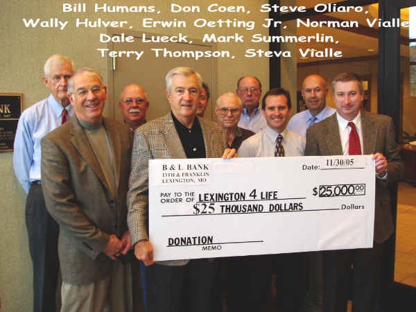 Committe holding donation by B & L Bank